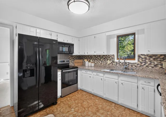 Photo 4 of Single family home for sale at 9829 105th Avenue N, Maple Grove, MN 55369 | MLS# 7149811 | Listing updated on 2026-10-02