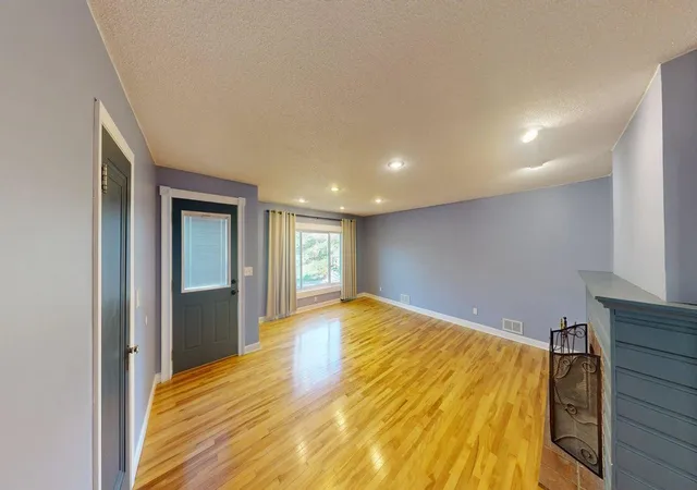 Photo 2 of Single family home for sale at 13510 Knollway Dr N, Hopkins, MN 55305 | MLS# 7151244 | Listing updated on 2026-10-23