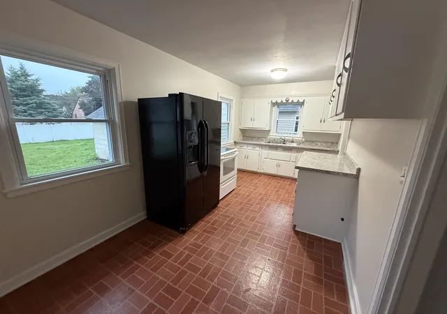 Photo 2 of Single family home for sale at 1410 4th Avenue Sw, Austin, MN 55912 | MLS# 7151643 | Listing updated on 2026-10-02