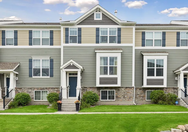 Photo 3 of Single family home for sale at 6957 W Locke Pointe Dr Ne, Minneapolis, MN 55432 | MLS# 7152395 | Listing updated on 2026-09-30