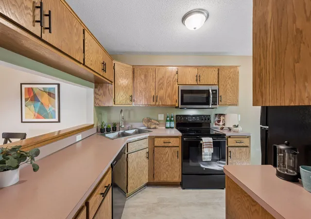 Photo 3 of Condo for sale at 7638 13th Street N, Saint Paul, MN 55128 | MLS# 7152707 | Listing updated on 2026-10-08