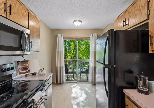 Photo 3 of Condo for sale at 7638 13th Street N, Saint Paul, MN 55128 | MLS# 7152707 | Listing updated on 2026-10-08