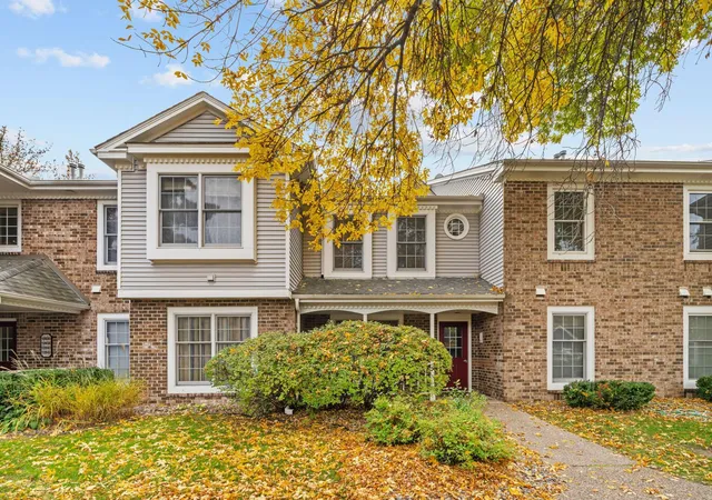 Listing Photo 1 - Condo for sale in building located at 10932 Quebec Ave S, Minneapolis, MN 55438