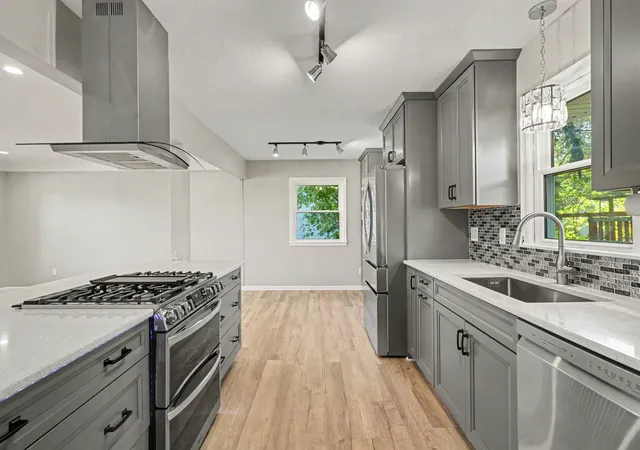 Photo 2 of Single family home for sale at 950 22nd Avenue Nw, Saint Paul, MN 55112 | MLS# 7156796 | Listing updated on 2026-10-19