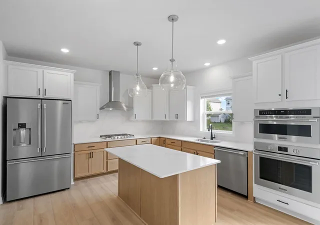 Photo 1 of Single family home for sale at 1677 Hadley Hills Dr NE, Rochester, MN 55906 | MLS# 7157372 | Listing updated on 2026-10-09
