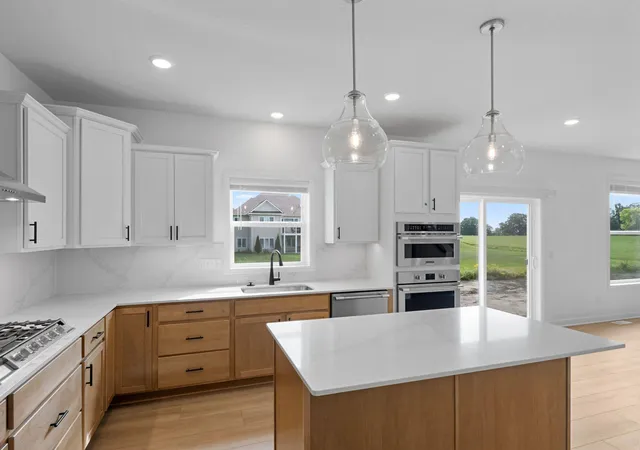 Photo 2 of Single family home for sale at 1677 Hadley Hills Dr NE, Rochester, MN 55906 | MLS# 7157372 | Listing updated on 2026-10-09