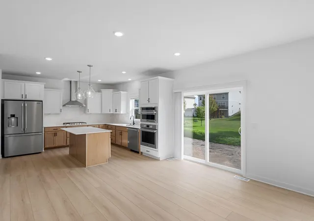Photo 3 of Single family home for sale at 1677 Hadley Hills Dr NE, Rochester, MN 55906 | MLS# 7157372 | Listing updated on 2026-10-09