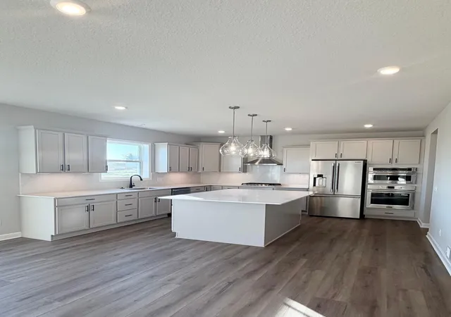 Photo 2 of Single family home for sale at 8633 Periwinkle Blvd, Saint Paul, MN 55129 | MLS# 7157523 | Listing updated on 2026-10-22