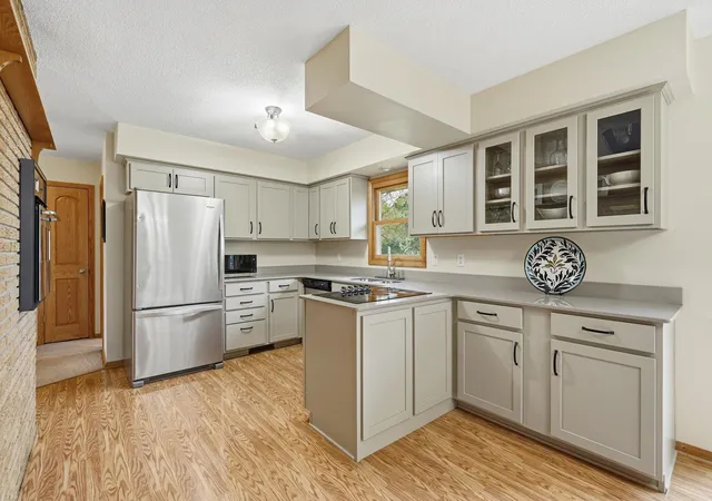 Photo 3 of Single family home for sale at 1343 Hillwind Rd NE, Minneapolis, MN 55432 | MLS# 7157834 | Listing updated on 2026-10-09