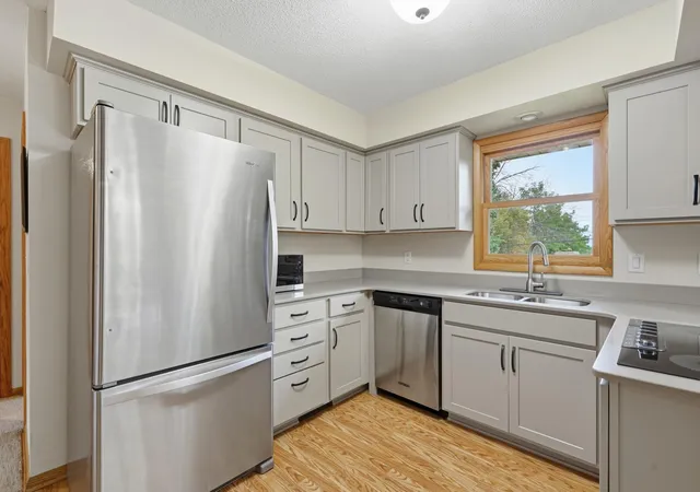 Photo 4 of Single family home for sale at 1343 Hillwind Rd NE, Minneapolis, MN 55432 | MLS# 7157834 | Listing updated on 2026-10-09