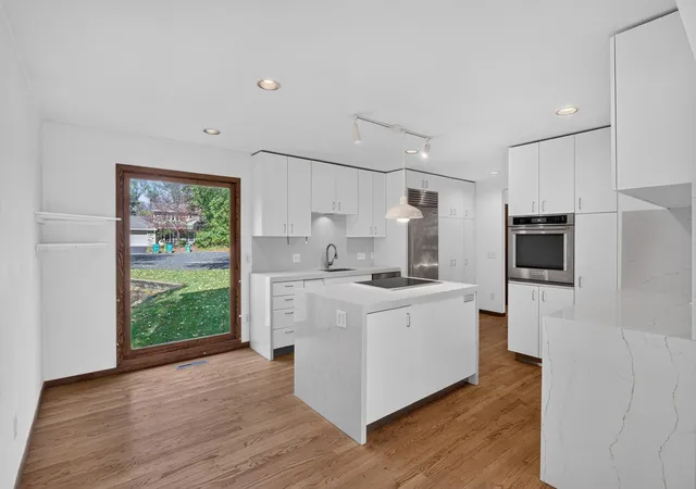 Photo 3 of Single family home for sale at 8725 Walton Oaks Dr, Bloomington, MN 55438 | MLS# 7159150 | Listing updated on 2026-10-21