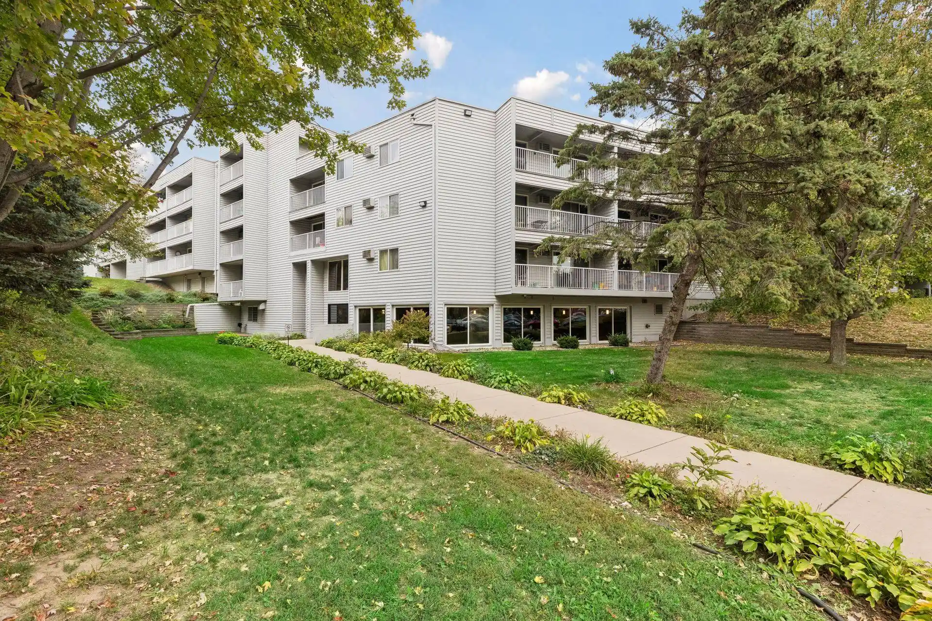 Listing Photo 1 - Condo for sale in 175 County Rd B2 E located at 175 County Rd B2 E, Little Canada, MN 55117 - Unit #101A