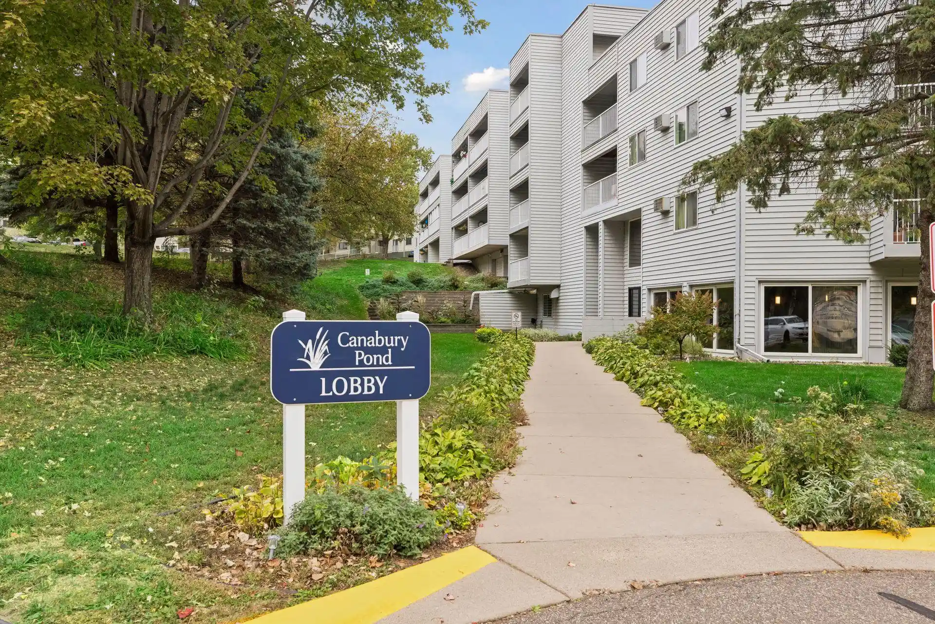 Listing Photo 2 - Condo for sale in 175 County Rd B2 E located at 175 County Rd B2 E, Little Canada, MN 55117 - Unit #101A