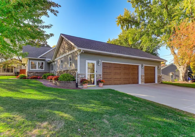 Photo 1 of Single family home for sale at 7697 Stillwater Way N, Oakdale, MN 55128 | MLS# 7160075 | Listing updated on 2026-10-29