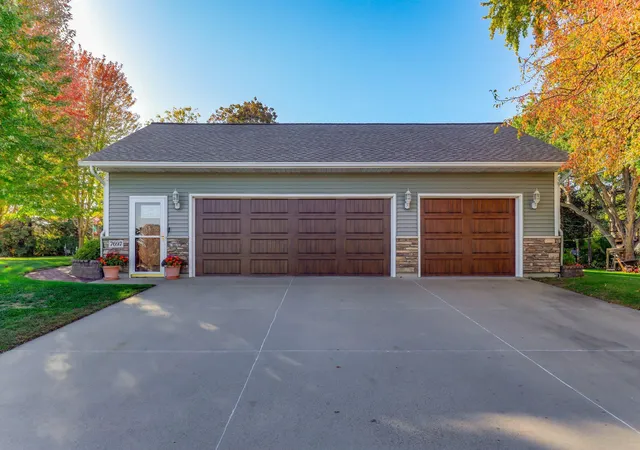 Photo 2 of Single family home for sale at 7697 Stillwater Way N, Oakdale, MN 55128 | MLS# 7160075 | Listing updated on 2026-10-29