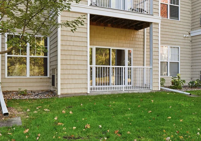 Listing Photo 1 - Condo for sale in building located at 1201 Hadley Ave N, Oakdale, MN 55128 - Unit #107