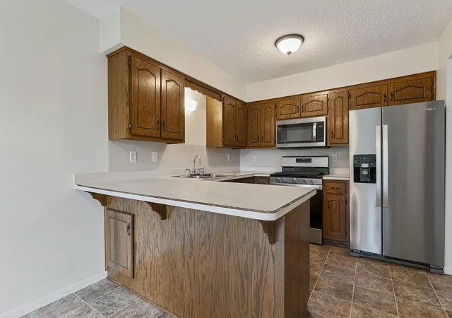 Photo 4 of Single family home for sale at 866 94th Avenue NE, Minneapolis, MN 55434 | MLS# 7161051 | Listing updated on 2026-10-17