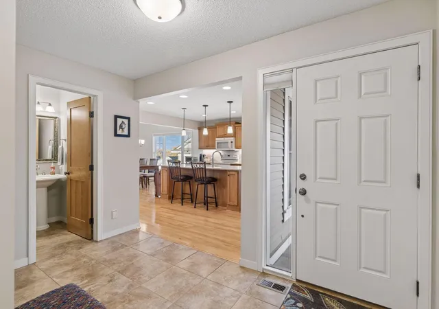 Photo 4 of Single family home for sale at 7077 Waterstone Ln, Saint Paul, MN 55125 | MLS# 7161852 | Listing updated on 2026-10-24