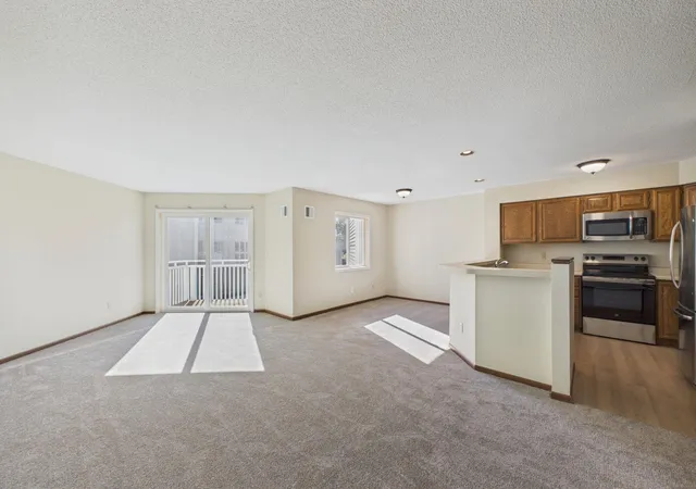 Listing Photo 1 - Condo for sale in building located at 1392 Carling Dr, St. Paul, MN 55108 - Unit #208
