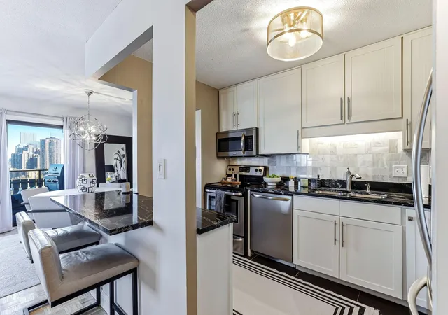 Photo 3 of Condo for sale at 410 Groveland Ave #902, Minneapolis, MN 55403 | MLS# 7164048 | Listing updated on 2026-10-23