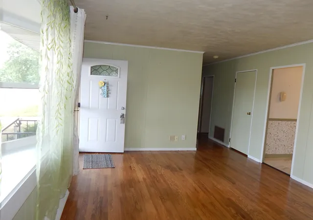 Photo 2 of Single family home for sale at 1009 W Coolspring Ave, Michigan City, IN 46360 | MLS# 845270 | Listing updated on 2026-09-23
