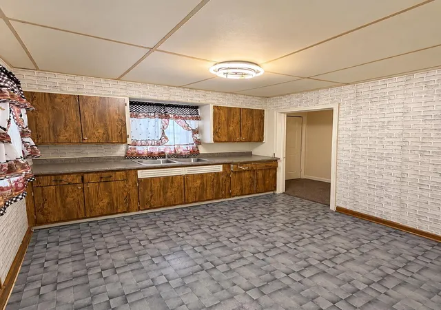 Photo 2 of Single family home for sale at 1405 W 2nd Avenue, Gary, IN 46402 | MLS# 846476 | Listing updated on 2026-10-07