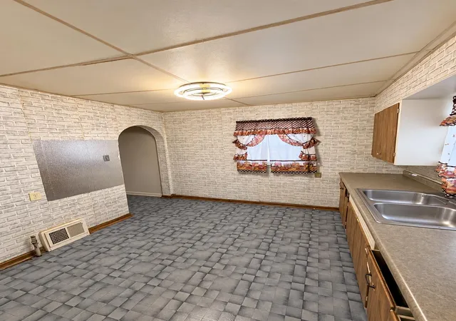 Photo 3 of Single family home for sale at 1405 W 2nd Avenue, Gary, IN 46402 | MLS# 846476 | Listing updated on 2026-10-07