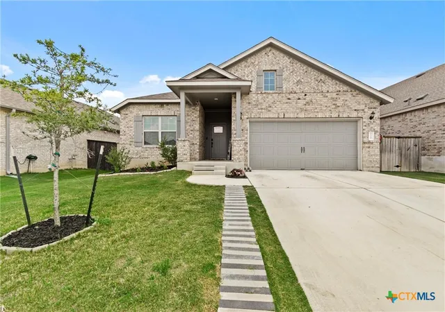 Photo 1 of Single family home for sale at 128 Smokebush Trl, Bastrop, TX 78602 | MLS# 607710 | Listing updated on 2026-03-18