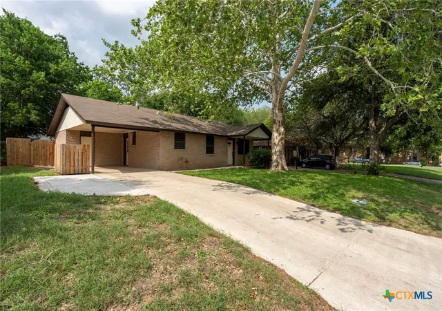 Photo 2 of Sale Pending at 903 Mimosa Dr, Lockhart, TX 78644 | MLS# 612202 | Listing updated on 2026-08-01