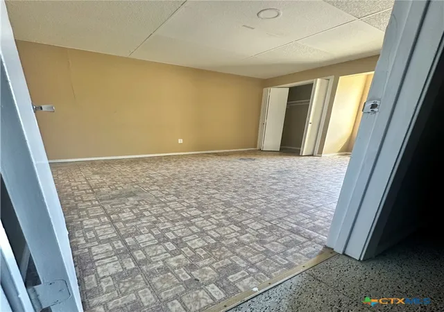 Listing Photo 2 - Condo for sale in building located at 1010 Nelson, Yoakum, TX 77995 - Unit #