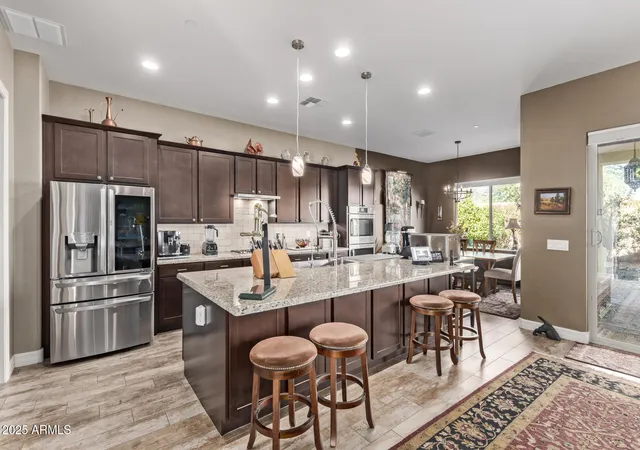 Photo 3 of Sale Pending at 9814 W Rowel Rd, Peoria, AZ 85383 | MLS# 6938344 | Listing updated on 2026-09-22