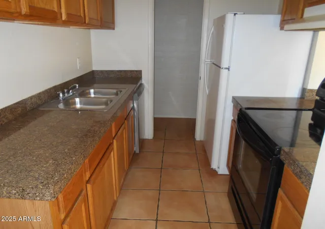 Photo 3 of Townhouse for sale at 5221 N 42nd Lane, Phoenix, AZ 85019 | MLS# 6939079 | Listing updated on 2026-09-08