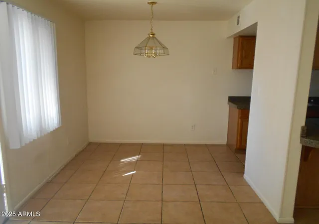 Photo 4 of Townhouse for sale at 5221 N 42nd Lane, Phoenix, AZ 85019 | MLS# 6939079 | Listing updated on 2026-09-08