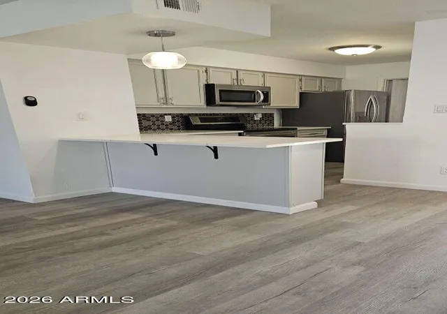 Listing Photo 1 - Condo for sale in building located at 2220 W Dora St, Mesa, AZ 85201 - Unit #114