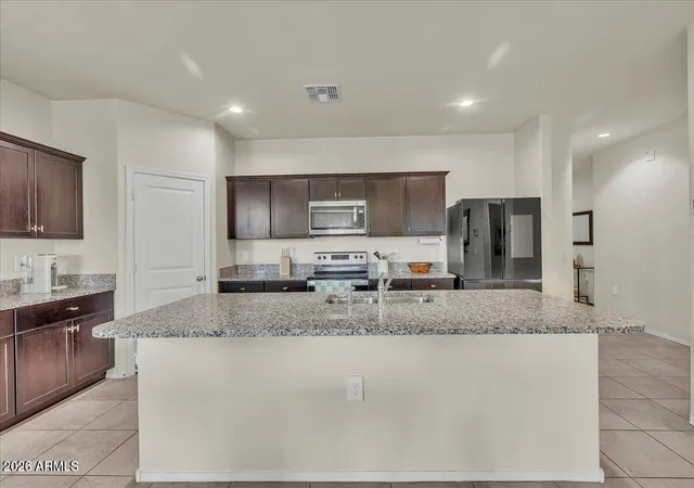 Photo 3 of Single family home for sale at 24609 W Raymond St, Buckeye, AZ 85326 | MLS# 6982628 | Listing updated on 2026-10-08