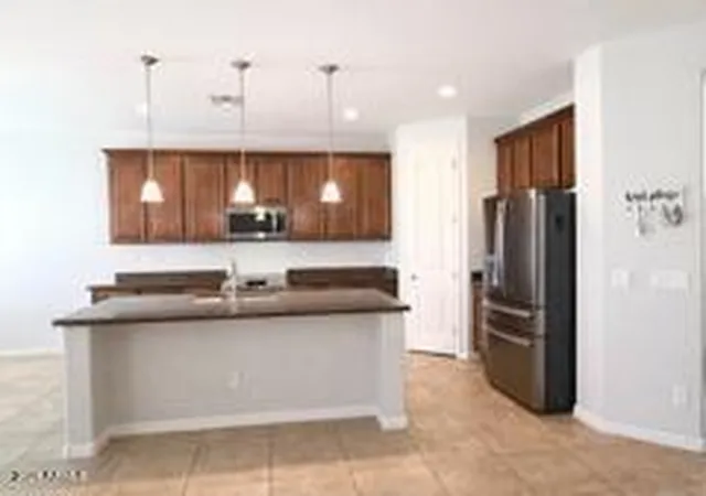 Photo 4 of Single family home for sale at 1927 N 142nd Avenue, Goodyear, AZ 85395 | MLS# 6988373 | Listing updated on 2026-04-06