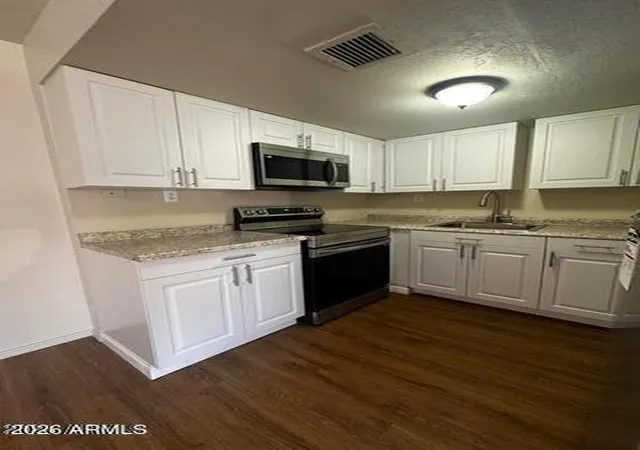 Photo 3 of Townhouse for sale at 2666 N 43rd Avenue #C, Phoenix, AZ 85009 | MLS# 7003587 | Listing updated on 2026-03-25