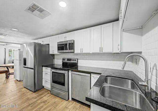 Single family home for sale at 8215 E 6th Avenue, Mesa, AZ 85208 | MLS# 7034235 | Listing updated on 2026-08-01