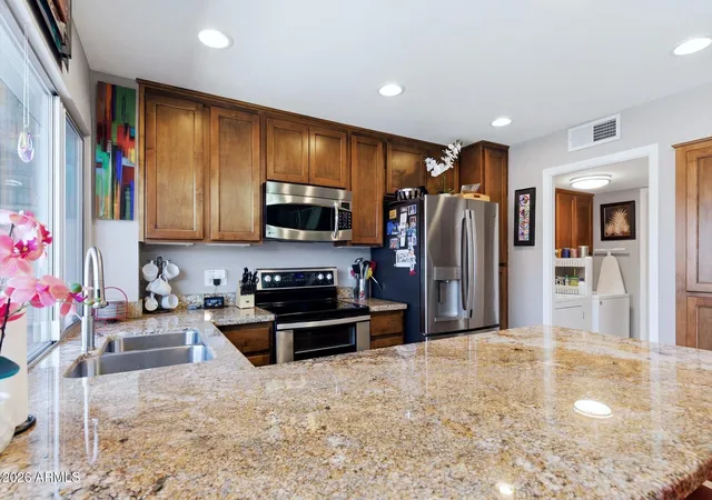 Photo 2 of Townhouse for sale at 4253 N Miller Rd, Scottsdale, AZ 85251 | MLS# 7036262 | Listing updated on 2026-08-24