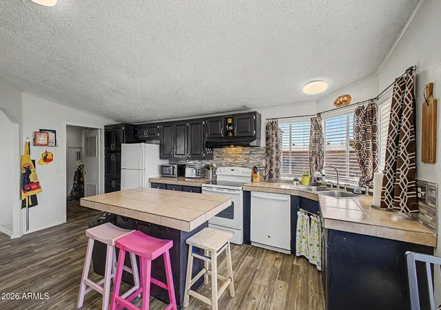 Photo 4 of Manufactured home for sale at 6907 W Patricia Ann Ln, Peoria, AZ 85382 | MLS# 7038423 | Listing updated on 2026-09-22