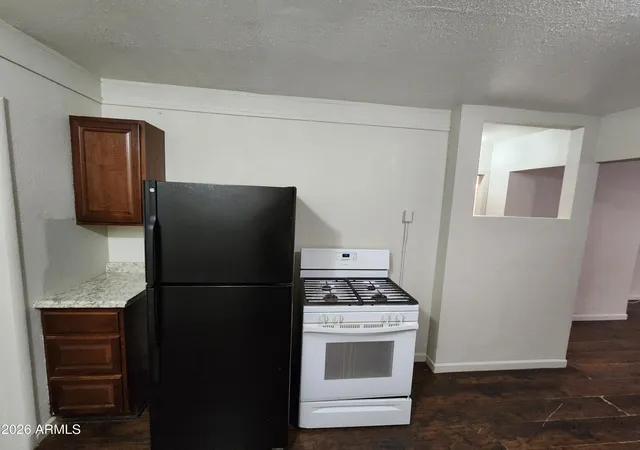 Photo 3 of Townhouse for sale at 404 E 4th Street, Casa Grande, AZ 85122 | MLS# 7040027 | Listing updated on 2026-08-20