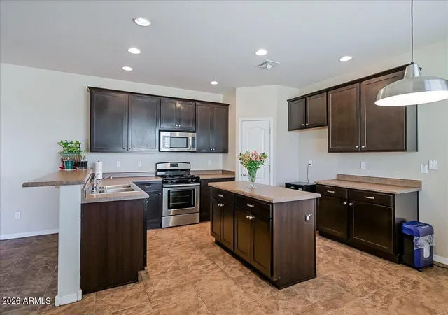 Photo 2 of Single family home for sale at 7318 W Midway Ave, Glendale, AZ 85303 | MLS# 7048489 | Listing updated on 2026-09-16