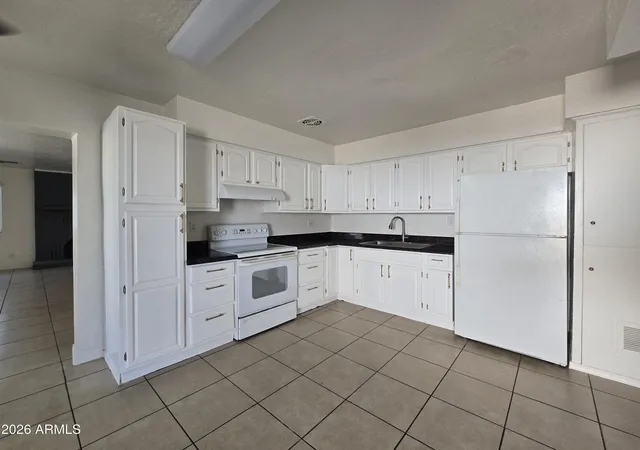 Photo 4 of Single family home for sale at 6917 W Highland Ave, Phoenix, AZ 85033 | MLS# 7041417 | Listing updated on 2026-06-12