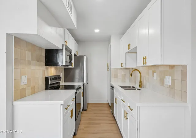 Photo 3 of Townhouse for sale at 5919 W Golden Ln, Glendale, AZ 85302 | MLS# 7043168 | Listing updated on 2026-09-24