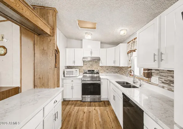Photo 3 of Manufactured home for sale at 9828 E Pueblo Ave #56, Mesa, AZ 85208 | MLS# 7046273 | Listing updated on 2026-09-09