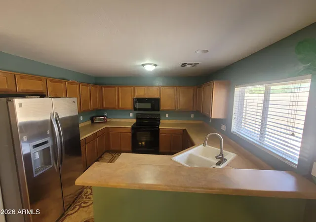 Photo 4 of Single family home for sale at 107 S 220th Drive, Buckeye, AZ 85326 | MLS# 7049074 | Listing updated on 2026-10-05