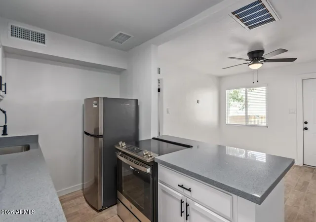 Photo 3 of Townhouse for sale at 1647 W Garfield St, Phoenix, AZ 85007 | MLS# 7052276 | Listing updated on 2026-09-17