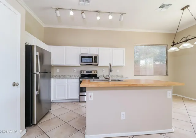 Photo 3 of Sale Pending at 15806 N 136th Lane, Surprise, AZ 85374 | MLS# 7052356 | Listing updated on 2026-09-01