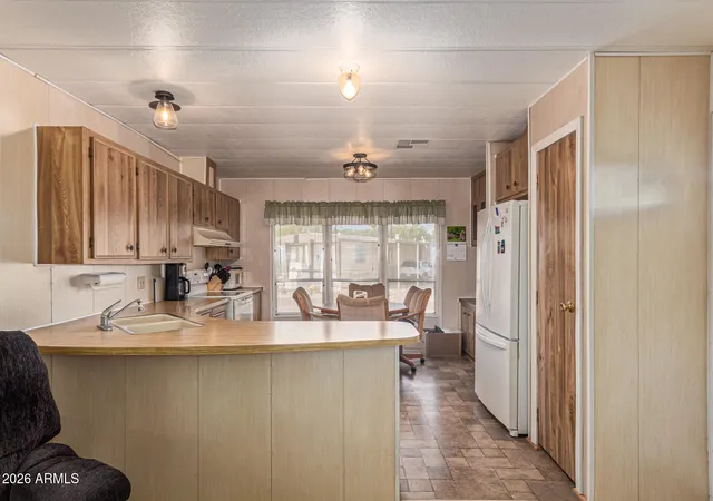 Photo 4 of Manufactured home for sale at 11425 E University Dr #49, Apache Junction, AZ 85120 | MLS# 7052935 | Listing updated on 2026-08-11