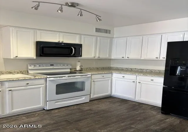 Photo 4 of Townhouse for sale at 909 N Revere St #F, Mesa, AZ 85201 | MLS# 7056420 | Listing updated on 2026-08-26